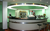 mplementation interior of the restaurant and the sports center in Slaný. Bar is designed as an open oval. Plasterboard ceiling describes the bar, the lighting enhances the curve. The material is white glossy laminate, worktop made of black laminate imitating the sparkling brilliance of the stone. Implementation period of 12 weeks. Author: Ing. arch. Marie Kulíková